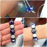 Pulseira Preta com pedras roxa e branca